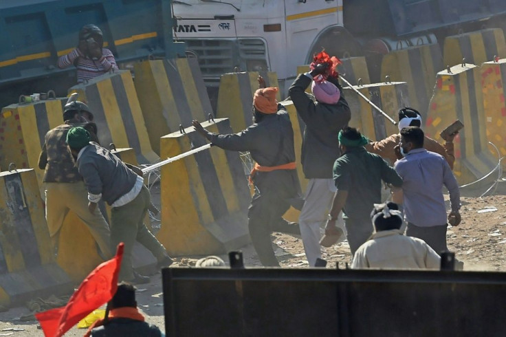 Farmers clash with police on the edge of New Delhi