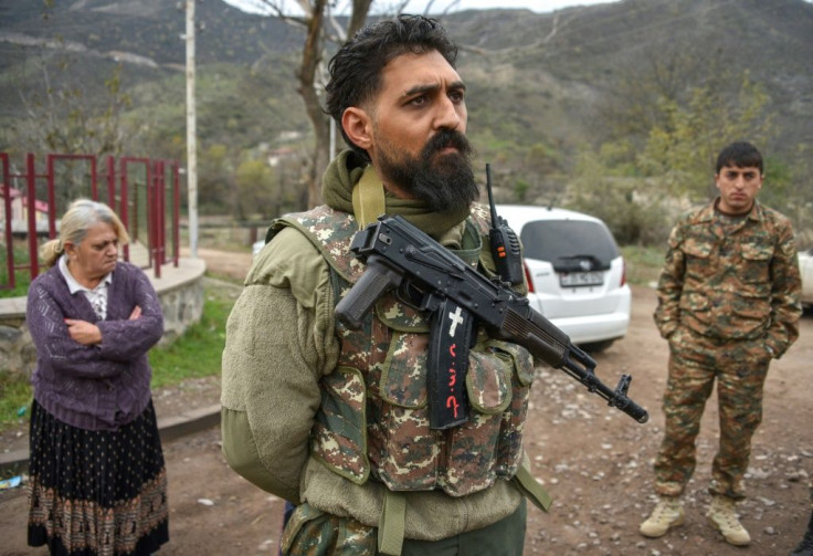 A volunteer villager patrols in the village of Zabux near the Lachin corridor
