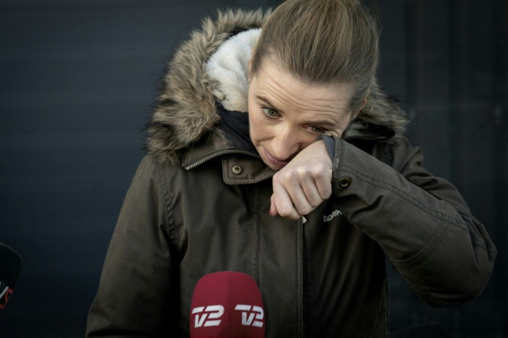 Denmark's Prime Minister Mette Frederiksen wiped away tears as she visited a mink farm affected by the culling on Friday.
