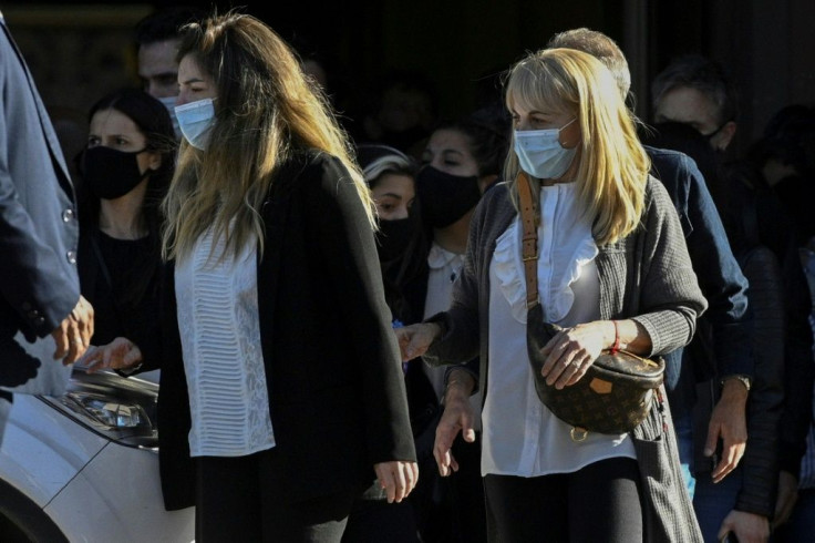 Diego Maradona's daughters Dalma (L) and his ex-wife Claudia Villafane at his funeral on Thursday, November 26, 2020 in Buenos Aires
