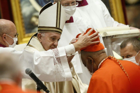 US Archbishop Wilton Gregory of Washington receives his biretta from Pope Francis
