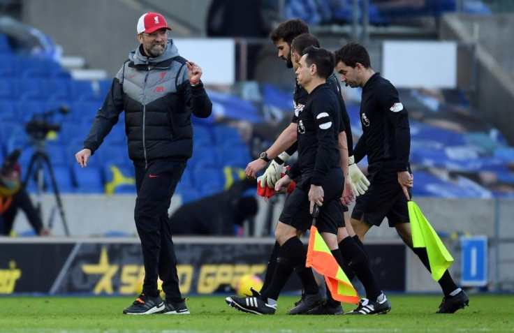 Liverpool boss Jurgen Klopp (left) was left frustrated by dropped points, VAR reviews and another injury after a 1-1 draw at Brighton