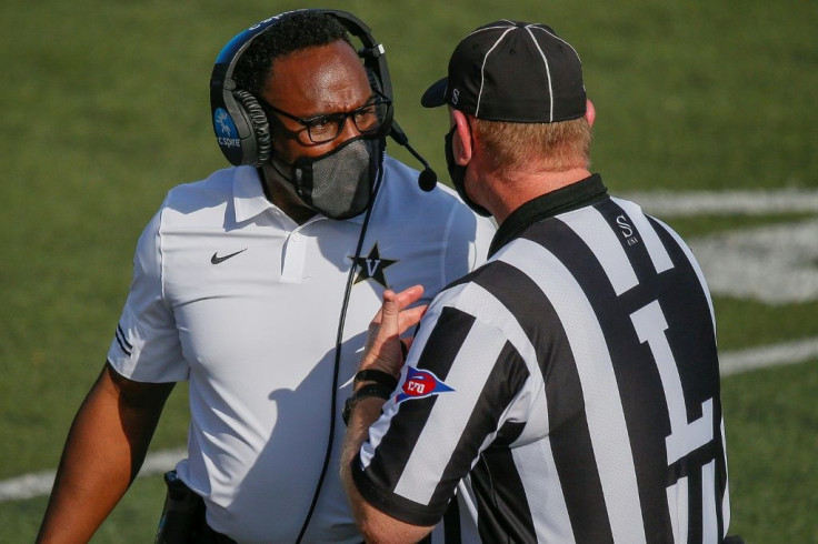 Vanderbilt University coach Derek Mason, left, said kicker Sarah Fuller executed her kickoff exactly as planned for the Connodores in her historic appearance Saturday in the team's 41-0 loss to Missouri