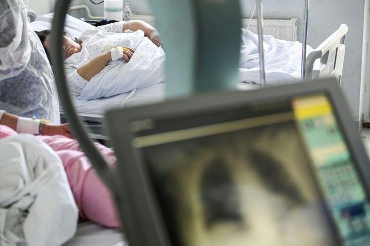 A Covid-19 patient in a bed at the Clinic for Infectious Disease in Pristina