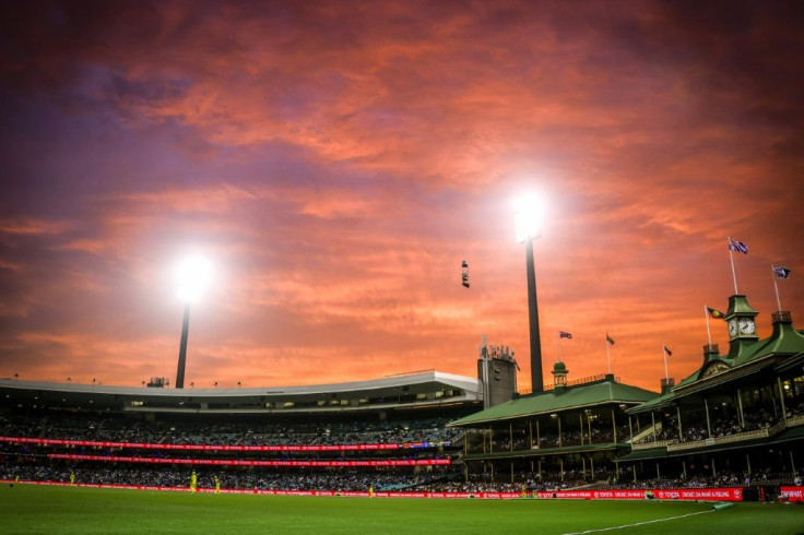 A fiery sunset over the Members' Stand during the one-day cricket match between India and Australia at the Sydney Cricket Ground in the sweltering city