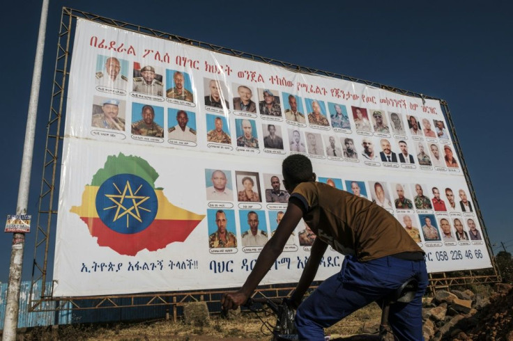 A sign lists members of the Tigray Peopleâs Liberation Front (TPLF) wanted by the Ethiopian Federal Police, as analysts warn the regional party could turn to insurgency-style warfare