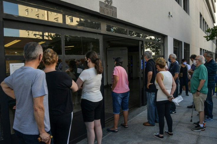 Brazil authorities are urging voters to bring their own pens, respect social distancing guidelines and disinfect their hands