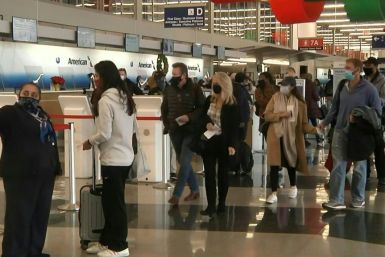 Top US scientist Anthony Fauci voiced his fears for a virus surge as millions of travelers returned home after the Thanksgiving holiday