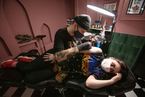 A tattoo parlour was among the businesses reopening