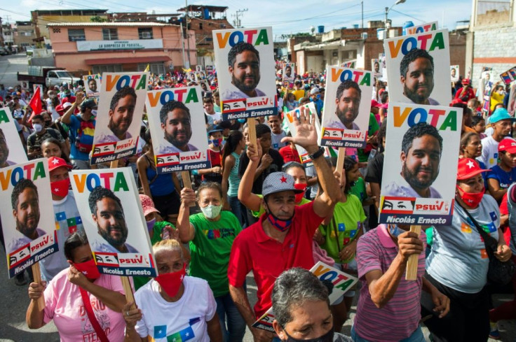 Supporters of Nicolas Ernesto Maduro Guerra, son of the Venezuelan president and candidate in the upcoming legislative elections, are seen at a campaign rally in La Guaira