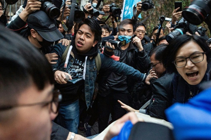 Ivan Lam (centre) has been convicted four times for pro-democracy protests or rallies against various government proposals