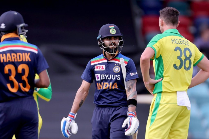 India captain Virat Kohli (C) was dismissed by Australia's Josh Hazlewood (R)