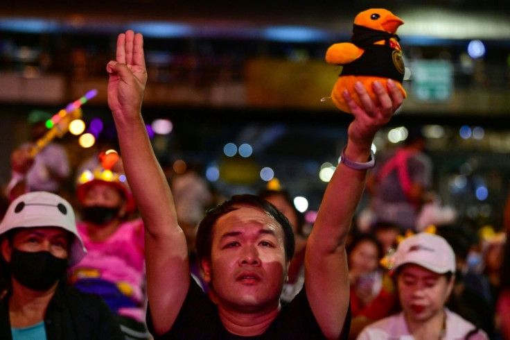 Thousands took to the streets of Bangkok on Wednesday night
