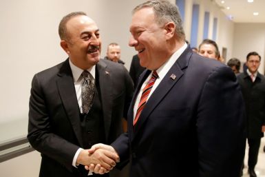 Pompeo (r) with Turkish Foreign Minister Mevlut Cavusoglu in Berlin earlier this year. On Wednesday the two men were said to have been involved in a heated exchange