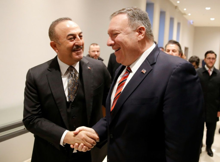 Pompeo (r) with Turkish Foreign Minister Mevlut Cavusoglu in Berlin earlier this year. On Wednesday the two men were said to have been involved in a heated exchange