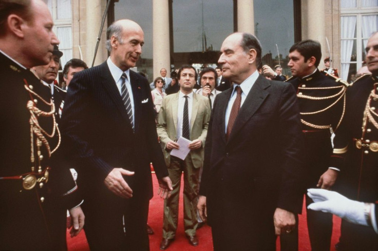 Former French president Valery Giscard d'Estaing (L) prepares to shake hands with his socialist successor Francois Mitterrand before leaving the Elysee Palace after the transfer of power, on May 21, 1981
