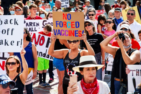 Protesters participate in an anti-vaccine demonstration in Boston in August 2020