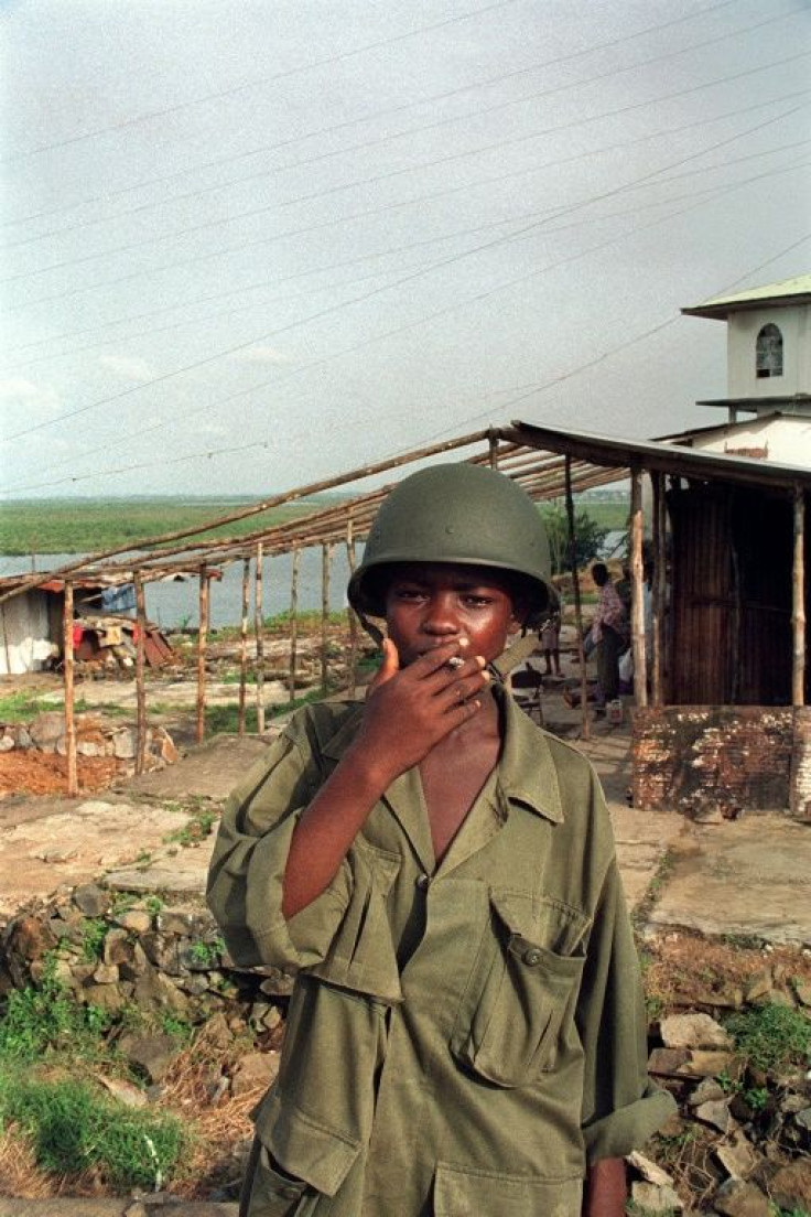 A child soldier of the ULIMO. Kosiah commanded the rebel group and one of the charges against him is recruiting children as fighters