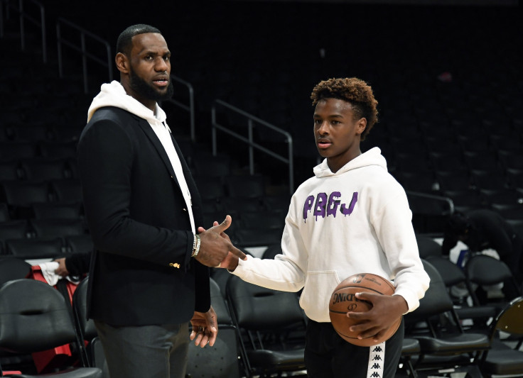 LeBron James #23 of the Los Angeles Lakers and his son LeBron James Jr., on the court after the Los Angeles Clippers and Los Angeles Lakers basketball game at Staples Center