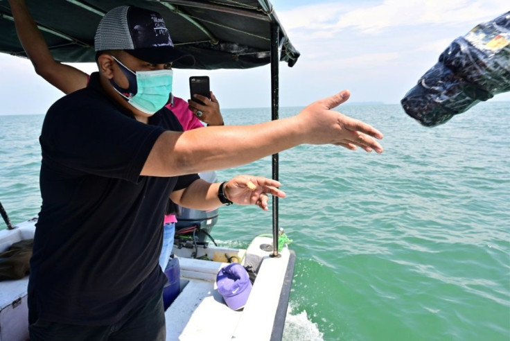 Scientists in Indonesia are using plastic monitoring devices with satellite beacons to monitor the flow of waste in the sea