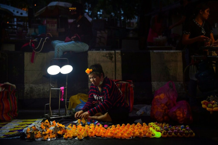 A vendor selling duck-themed merchandise at a rally by pro-democracy protesters in Bangkok