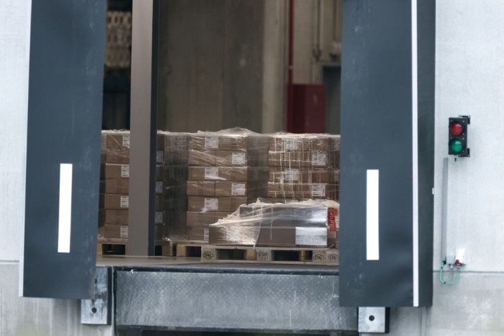 Trucks are loaded on December 3, 2020 at a Pfizer factory in Puurs, Belgium where Covid-19 vaccines are being produced for Britain