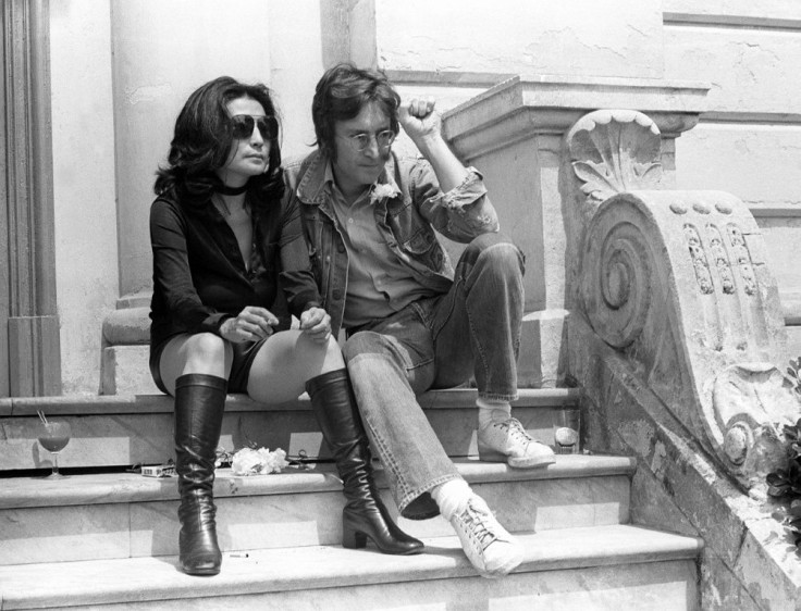 John Lennon and Yoko Ono pose in Cannes on May 17, 1971 where they presented their movies 'Apotheosis' and 'The Flu', a few months before they moved to New York, where they would spend the rest of their lives
