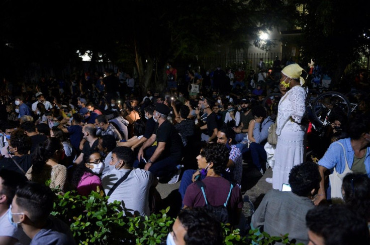 A group of intellectuals and artists hold a rare demonstration outside Cuba's Ministry of Culture early on November 28, 2020 after having gathered the previous day