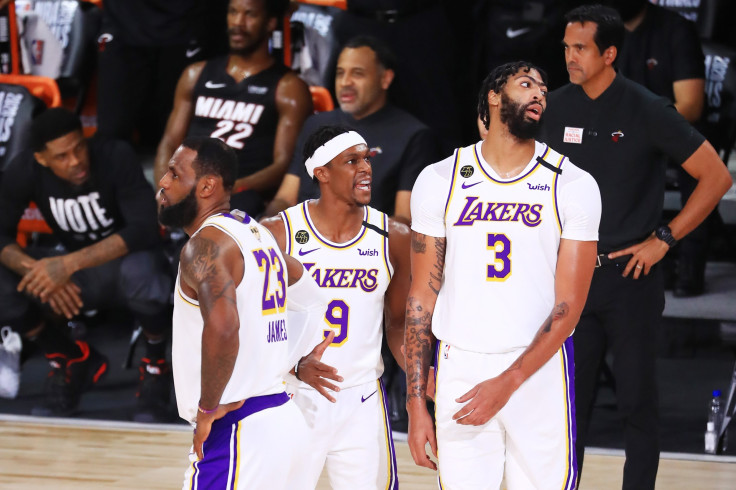 Rajon Rondo #9 of the Los Angeles Lakers, Anthony Davis #3 of the Los Angeles Lakers and LeBron James #23 of the Los Angeles Lakers 