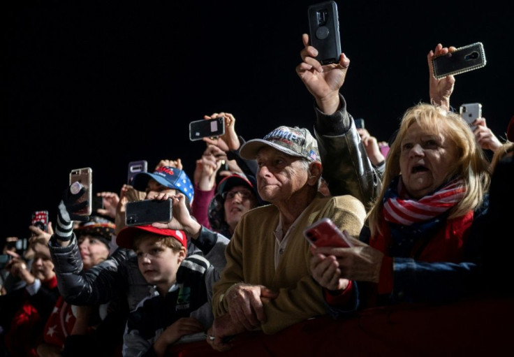 Officials have highlighted the deadly risk of crowded events such as President Donald Trump's rally to support Republican Senate candidates in Valdosta, Georgia