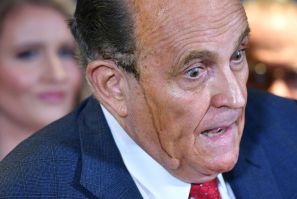 Donald Trump's personal lawyer Rudy Giuliani (pictured November 19, 2020) is often seen without a mask when he appears in public to defend the president's already fading efforts to challenge his election loss