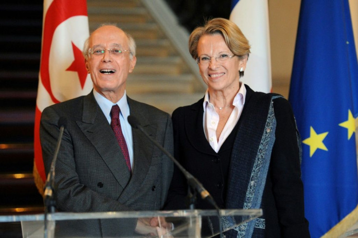 French former foreign minister Michele Alliot-Marie (R) with her Tunisian counterpart Ahmed Abderraouf Ounais