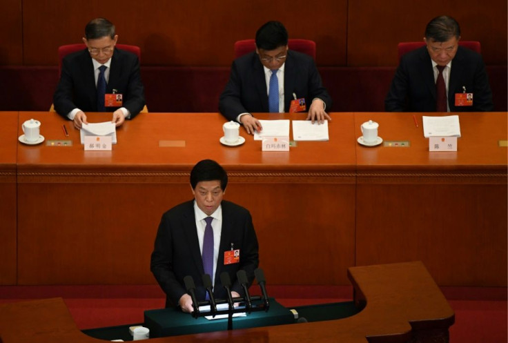 National People's Congress Chairman Li Zhanshu, seen addressing the Great Hall of the People in Beijing in May 2020, has been spared in US sanctions which have targeted his vice chairs over the clampdown in Hong Kong