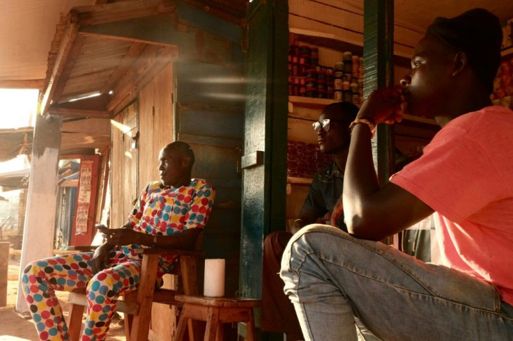 Shopkeepers at Bambari market, frequented by both Christians and Muslims