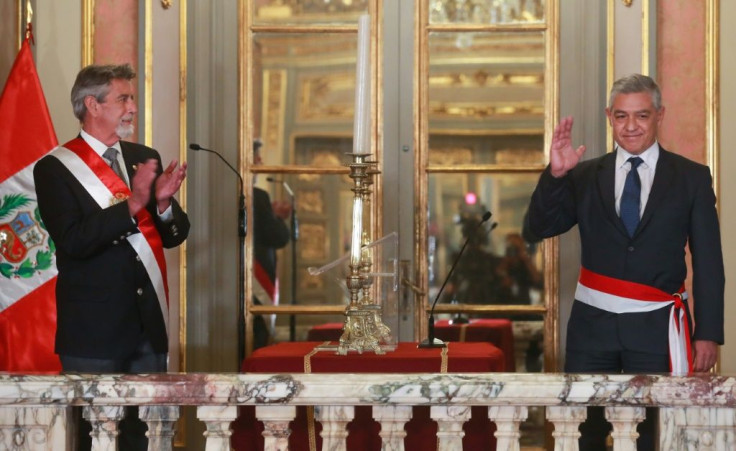 Peru's interim President Francisco Sagasti (L) swore in Jose Manuel Elice (R) as the new interior minister