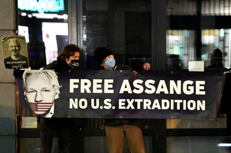 Demonstrators called for Assange's release at a protest outside the British Embassy in Brussels on Monday