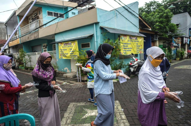 More than 100 million Indonesians were eligible to cast a ballot, despite warnings the poll would worsen the nation's Covid-19 crisis