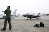 A South Korean fighter pilot stands in 2019 next to a F-35 fighter-jet of the type that the United States is seeking to sell to the United Arab Emirates