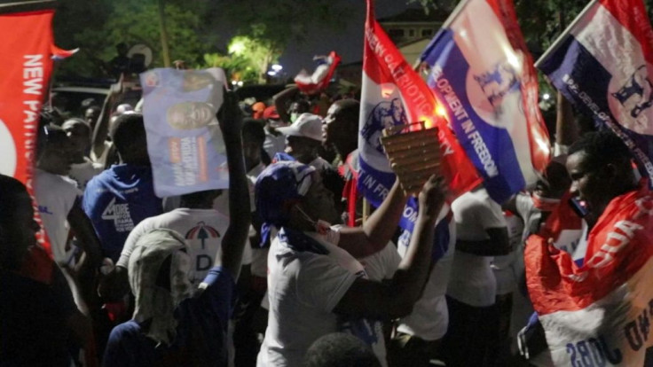 Supporters of Ghana's President Nana Akufo-Addo gather outside his residence to celebrate his re-election