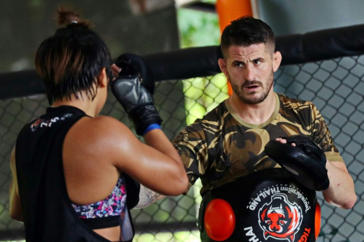 Thailand's first UFC fighter Loma Lookboonmee trains with George Hickman at Tiger Muay Thai. "There are MMA events in Thailand and now Loma has been signed that's helped Thailand become a hotbed for MMA training," says Hickman