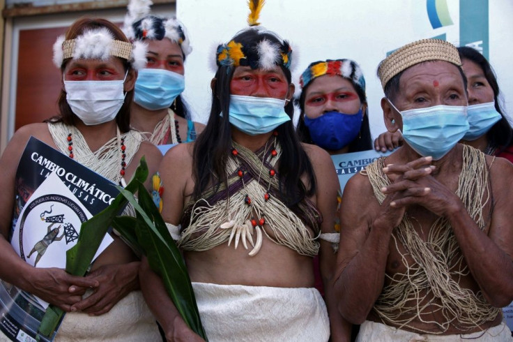 Waorani indigenous women pictured after filing a climate change lawsuit against Chinese oil company PetroOriental in El Coca, Orellana province, Ecuador, on December 10, 2020