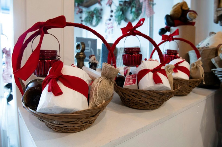 Gift baskets containing toilet paper are displayed inside a restaurant trying to adapt and attract more customers during the coronavirus pandemic and stay-at-home orders in Los Angeles, California
