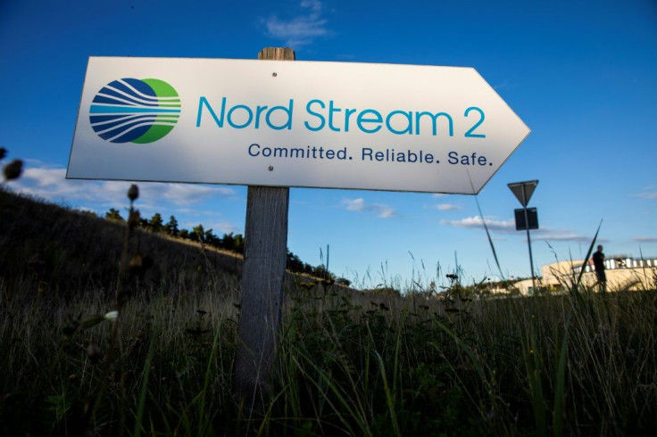 A sign directs traffic towards the Nord Stream 2 gas line landfall facility entrance in Lubmin, Germany in September 2020
