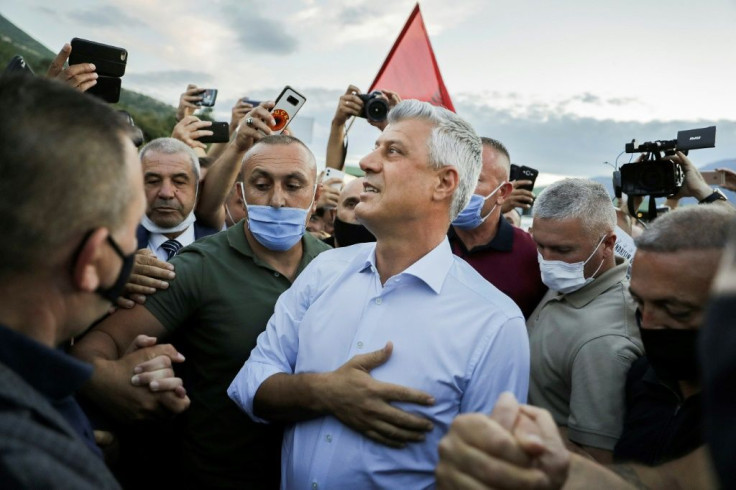 Former President Hashim Thaci (C) and other rebel chiefs were once feted for liberating Kosovo from Serbia in a 1990s war