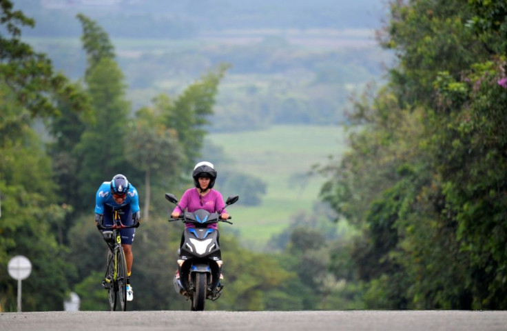 Colombian paralympian Juan Jose Florian putting in miles of training around his home town of Granada, Colombia, led by his wife and coach Angie Garces, in November 2020