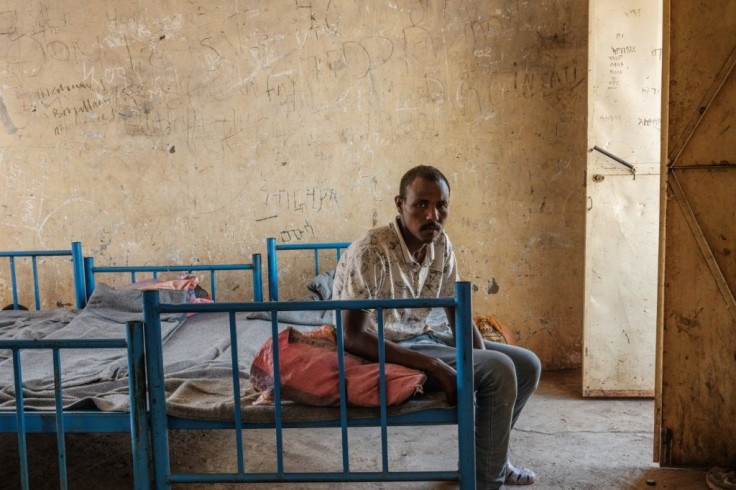 Eritrean refugee Kheder Adam, fled Ethiopia's Tigray conflict, saying soldiers attacked the camp in which he had been living with his wife and children