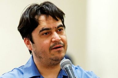 Ruhollah Zam, a former opposition figure who had lived in exile in France and had been implicated in anti-government protests, speaks during his trial at the Revolutionary Court in Tehran in June