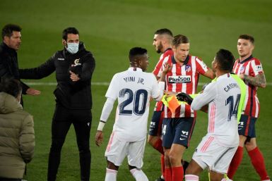 Heated: Atletico and Real players argue