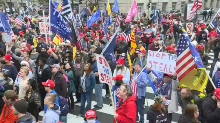 Supporters of US President Donald Trump protest the outcome of the 2020 presidential election on Freedom Plaza in Washington, DC, ahead of the electoral college vote