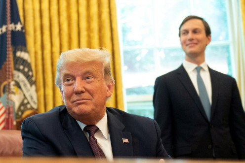 Jared Kushner stands next to his father-in-law, US President Donald Trump, as they announce Bahrain's recognition of Israel in September 2020